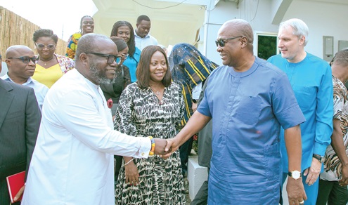 John Dramani Mahama (2nd from right) exchanging pleasantries with Dr Kenneth Ashigbey, CEO, Ghana Chamber of Telecommunications. With them include Patricia Obo-Nai (middle), CEO, Telecel Ghana, and Stephen Blewett (right), CEO, MTN Ghana