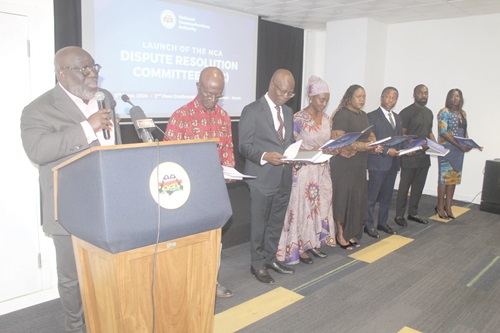 Members of the Dispute Resolution Committee being sworn in by Okatakyie Ababio Boakye Danquah II (left), Board Chairman, NCA.  Picture: ESTHER ADJORKOR ADJEI