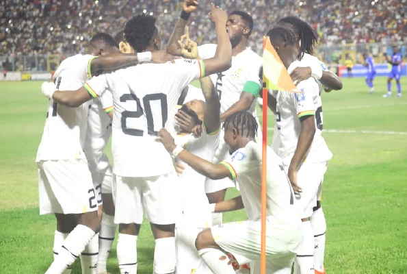 Jordan Ayew (mobbed by teammates) scored a hat-trick as the Black Stars beat Central African Republic 4-3. Photos: EMMANUEL BAAH