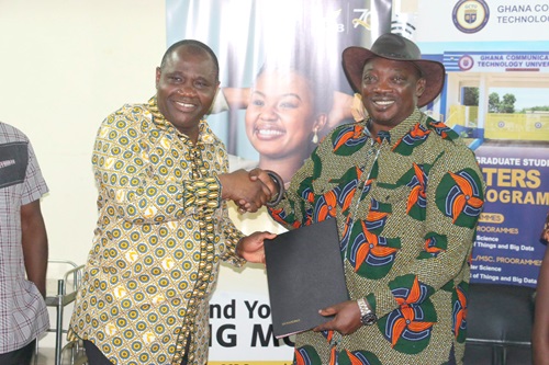 Emmanuel Odartey Lamptey (left), Deputy Managing Director, Operations, GCB, and Prof. Emmanuel Ohene Afoakwa, Vice-Chancellor,  GCTU, with the signed agreement