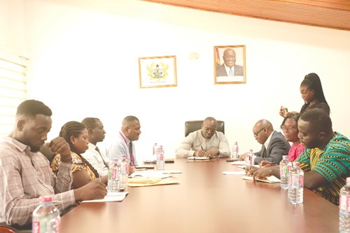 Franklin Sowa (4th from left), Director of Marketing, GCGL, explaining a point during the meeting. Picture: EDNA SALVO-KOTEY