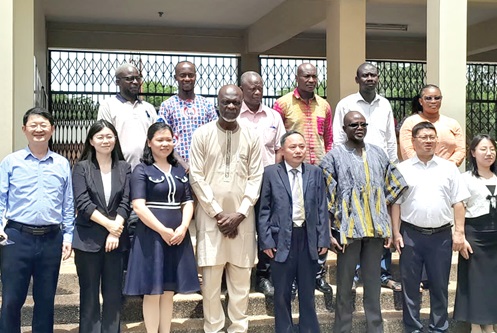 Shani Alhassan Shaibu (4th from left), Northern Regional Minister, with Prof.  Liu Guangrong (4th from right), Vice-President, Jiangxi Academy of Agricultural Science, and some staff of the NRCC and the Academy in Tamale