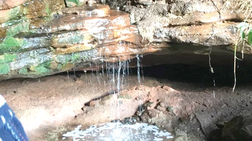One of the caves gradually developing into a waterfall