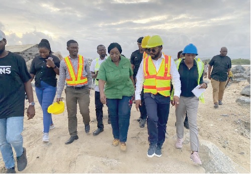 Dr Prince Hamid Armah (2nd from right), Deputy Minister, Works and Housing, being conducted round the Glefe Coastal Protection Project site by Rev. Dr Gifty Akusika Lamptey (4th from left), CEO, Sidalco Group of Companies. Picture: Benjamin Xornam Glover