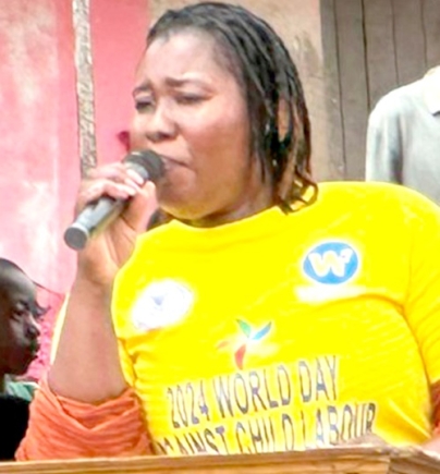 Eunice Nti, Atwima Nwabiagya Municipal Health Promoter, speaking at the durbar