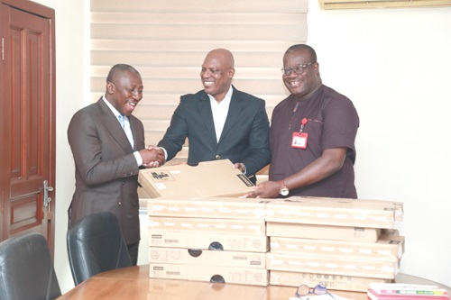  Alexander Afenyo-Markin (left), Majority Leader, presenting the laptops to Ato Afful (2nd from right), MD, GCGL, and Theophilus Yartey (right), Editor, Graphic. Picture: DOUGLAS ANANE-FRIMPONG