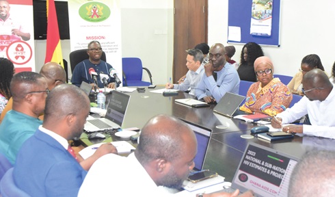  Dr Kyeremeh Atuahene (Head of table), Director-General, Ghana Aids Commission, addressing participants in the gathering. Picture: ERNEST KODZI