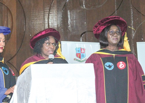 Prof. Victoria Bam (left), President of Ghana College of Nurses and Midwives, inducting new associate members into the GCNM. Looking on is Hannah A. O Acquah, Rector of Ghana College of Nurses and Midwives. Picture: ERNEST KODZI