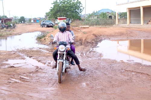 A motorist plying a bad road
