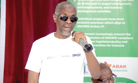  Joseph Atsu Homadzi (inset), President, Ghana Federation of Disability Organisations, speaking at the event. Picture: ELVIS NII NOI DOWUONA 