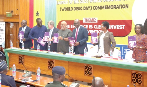  Kenneth Adu-Amanfoh (3rd from right), Director-General, Narcotics Control Commission, being assisted by Charles Abani (middle), Resident Coordinator, UN System in Ghana; Delese Darko (right), Chief Executive Officer, Food And Drugs Authority; Cheikh Toure (2nd from left), Head, Law Enforcement Section, UNODC Regional Representative for West and Central Africa, and some dignitaries at the launch of the report in Accra. Picture: ELVIS NII NOI DOWUONA