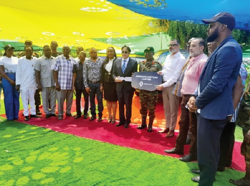 Jihad Hijazi (4th from right), Chairman and CEO of Premium Motors, presenting a symbolic key to the Renault Logan car to Maj. Gen. Onwona, Chief of Army Staff, while Ambassador Maher Kheir and other dignitaries join in support