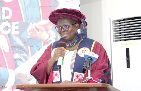 Dr Yvonne Yirenkyiwaa Esseku (inset), Rector, College of Pharmacists, addressing the inductees 
