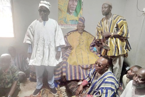 Albert Kan-Dapaah (left), National Security Minister, and Stephen Asamoah Boateng (squatting in front) of Yagbonwura Bii-Kunuto Jewu Soale I at his Palace at Damongo