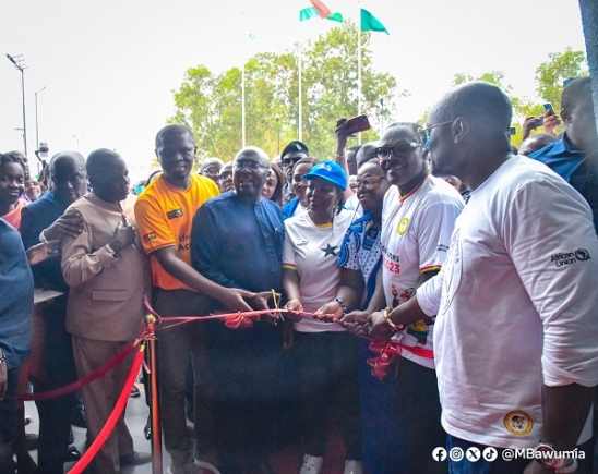 Vice-President Dr Mahamudu Bawumia (with scissors raised), cutting a tape to inaugurate the University of Ghana Sports Complex and Rugby Stadium in Accra. With him are  Mustapha Ussif (2nd from left), Minister of Youth and Sports, Professor Nana Aba Appiah Amfo (3rd from right), Vice-Chancellor of the University of Ghana, and Dr Kwaku Ofosu-Asare (2nd from right), Chairman of the LOC
