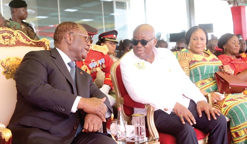 Alassane Ouattara (left), Cote d’Ivoire President, interacting with President Akufo-Addo at the ceremony. With them are Rebecca Akufo-Addo (2nd from right), the First Lady, and  Getrude Araba Torkonoo (right), the Chief Justice. Picture: SAMUEL TEI ADANO