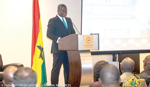 Samuel Abu Jinapor, Minister of Lands and Natural Resources, addressing the conference