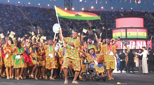 Ghana's contingent waving the national flag at the event