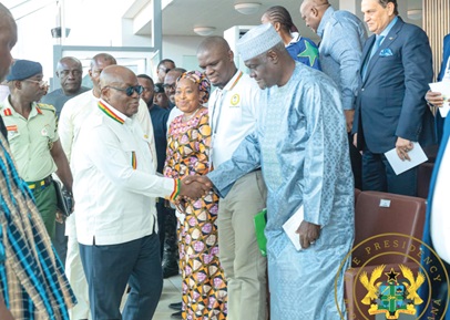 President Akufo-Addo in a handshake with an official of the Association of National Olympic Committees of Africa at the opening ceremony 