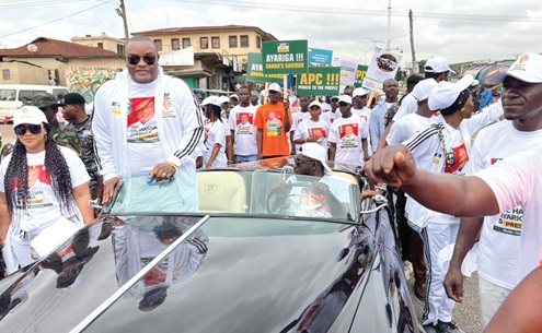 Hassan Ayariga (arrowed),  Founder and Chairman of APC, with some members of the party on a procession through some streets in Kumasi 