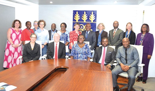 Professor Michael Kotlikoff (seated 2nd from left), Provost of Cornell University; Professor Nana Aba Appiah Amfo (seated middle), UG Vice-Chancellor, and Rev John Ntim-Fordjour (seated 2nd from right), a Deputy Minister of Education, with other members of the delegation and senior UG officials.