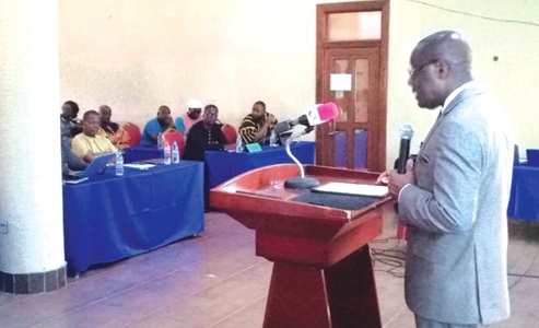 Rev. Dr Ernest Adu-Gyamfi, Chairman, National Peace Council, addressing the participants