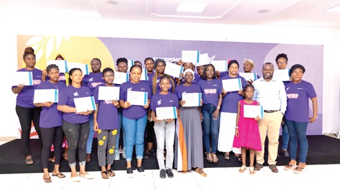 Participants after the training with Sandra Amarquaye (arrowed),  the Corporate Communications Manager of Karpowwrship