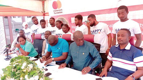 Officials and some beneficiaries of the programme after the launch