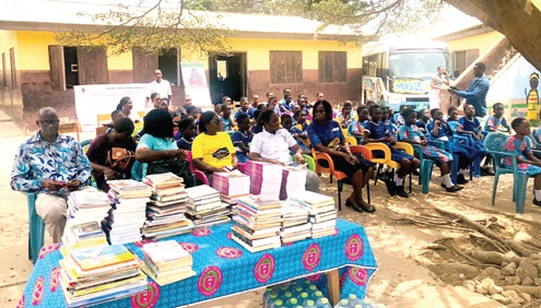 Pupils of Bishop Girls Basic School and officials of the Reading Clinic