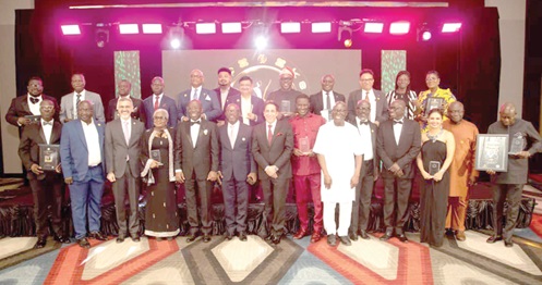 Dr John Ofori-Tenkorang (5th from left), Director-General, SSNIT, and other dignitaries with the award winners after the event