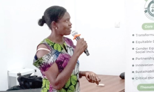 Zita Nangmenyele Abuntori (right), Research Scientist, Water Research Institute, presenting findings of the study in Tamale