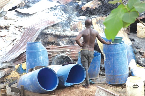 Some barrels used to douse the fire Some barrels used to douse the fire