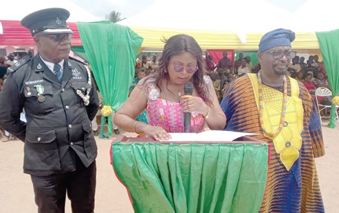 Eunice Naalier (middle) speaking at the ceremony