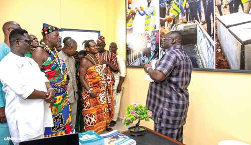George Asiedu (right), National Coordinator of the Greater Accra Metropolitan Area Water and Sanitation Project, explaining a point during the launch of the biodigester centre