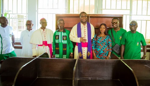 The Chief Executive Officer (CEO) of pharmaceutical company,  Flokefama, Mr Emmanuel Kenney in group photo with the management members of the school 