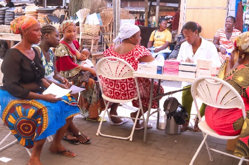 Some of the residents of Kaneshie Zongo Market going through the medical screening.