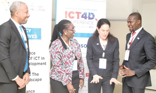 Ursula Owusu-Ekuful (2nd from left), Minister of Communications and Digitalisation,  interacing with Jude Marie Banatte (left), Regional Director for Central Africa Regional Office of CRS; Jennifer Overton (2nd from right), Regional Director for the West Africa Regional Office of CRS and Daniel Mumuni, Country Representative of CRS, Ghana. Picture: EMMANUEL QUAYE