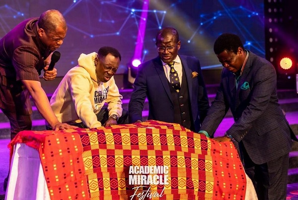 From Left: Rev Dr Stephen Yenusom Wengam; Rev Dr Kwadwo Boateng Bempah; Bishop Eddy Addy and Bishop Boniface Keelson, praying over the book to unveil it.