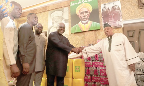 John Kofi Adomakoh (4th from left), Managing Director, GCB Bank PLC, presenting the items to Alhaji Latif Abdulsalam (right), Chief Protocol Officer of the National Chief Imam. With them are officials of GCB Bank PLC. Picture: EDNA SALVO-KOTEY