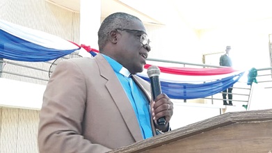 Rev. Dr Kwabena Opuni-Frimpong (left), a former General Secretary of the Christian Council of Ghana, delivering the lecture while students (right) listen attentively