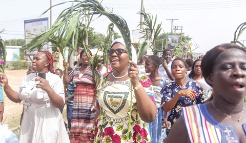 Some members of Presbyterian  Church of Ghana, Gbawe Zero Preaching Point on a procession to mark Palm Sunday. Picture: Caleb Vanderpuiye