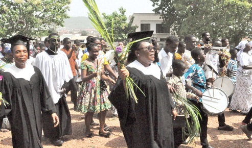 Members of the congregation at the Dela Cathedral of the E.P. Church, Ghana in a pocession Members of the congregation at the Dela Cathedral of the E.P. Church, Ghana in a pocession
