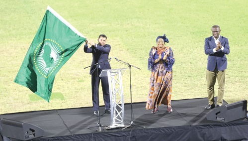 Ashraf Sobhy,  the Egyptian Minister of Youth and Sports, receives the African Games flag to signify Egypt as the next host country