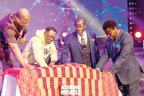 From Left: Rev. Dr Stephen Yenusom Wengam, Rev. Dr Kwadwo Boateng Bempah, Bishop Eddy Addy and Bishop Boniface Keelson praying over the book to unveil it
