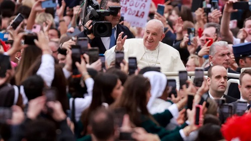 Pope Francis waved to crowds at the Vatican on the day of the Easter Mass, at St. Peter's Square
