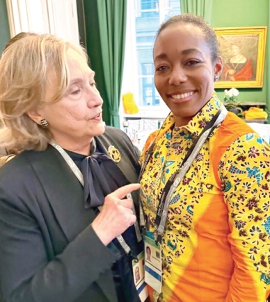 Hillary Clinton (left), former US First Lady, in a tete-a-tete with Dr Zanetor Agyeman-Rawlings  after one of the panel discussions