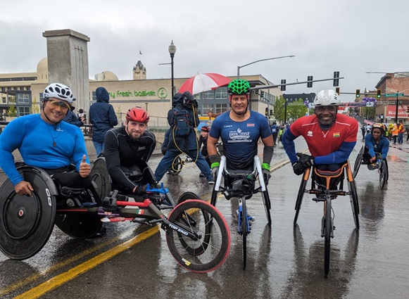 Botsyo Nkegbe (right) with some of the athletes before the race