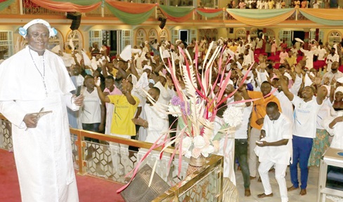 Prophet Nakoa Nazareth Ansah Jamson (left), Founder, Israel King of Jews Church, and some church members dancing to the glory of God