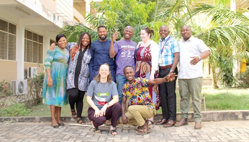 Rhea Simms (left squatting), Senior Project Manager, YCI, and other members with the BTU team after the event
