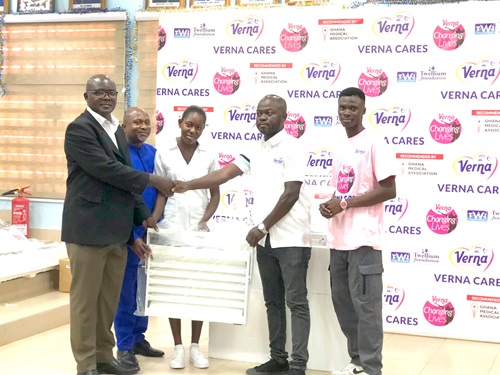 Kendrick Yehowada (2nd from right), Event Manager, Twellium Industrial Company Ltd, presenting the equipment to Dr Andrews Mensah (left), Greater Accra Chairman of GMA, and Dr Frank Voado (2nd from left), Vice Chairman, Greater Accra GMA